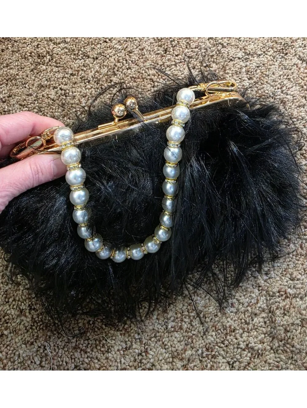 Elegant Black Faux Fur Clutch Bag with Pearl Handle and Gold Frame